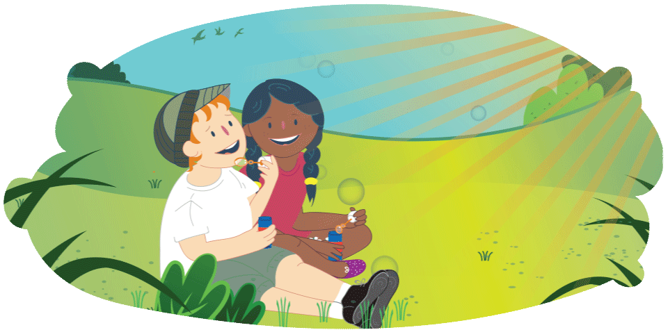 Two kids sitting in grass blowing bubbles