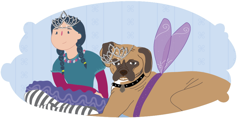 Child and dog wearing tiaras and fairy wings