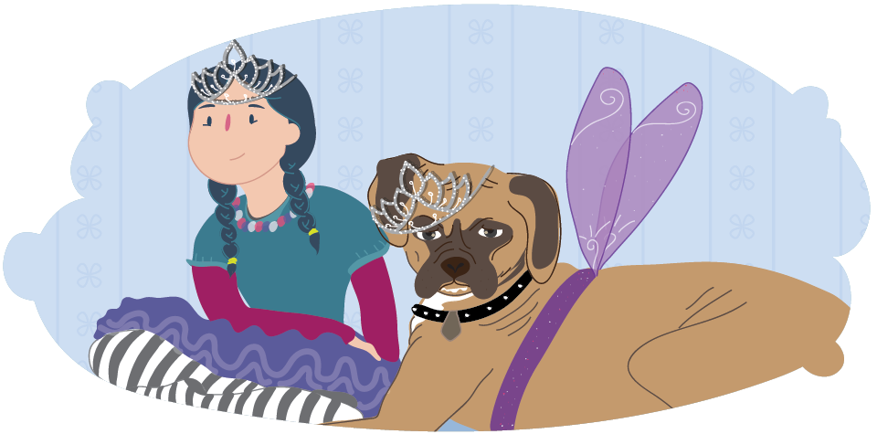 Child and dog wearing tiaras and fairy wings