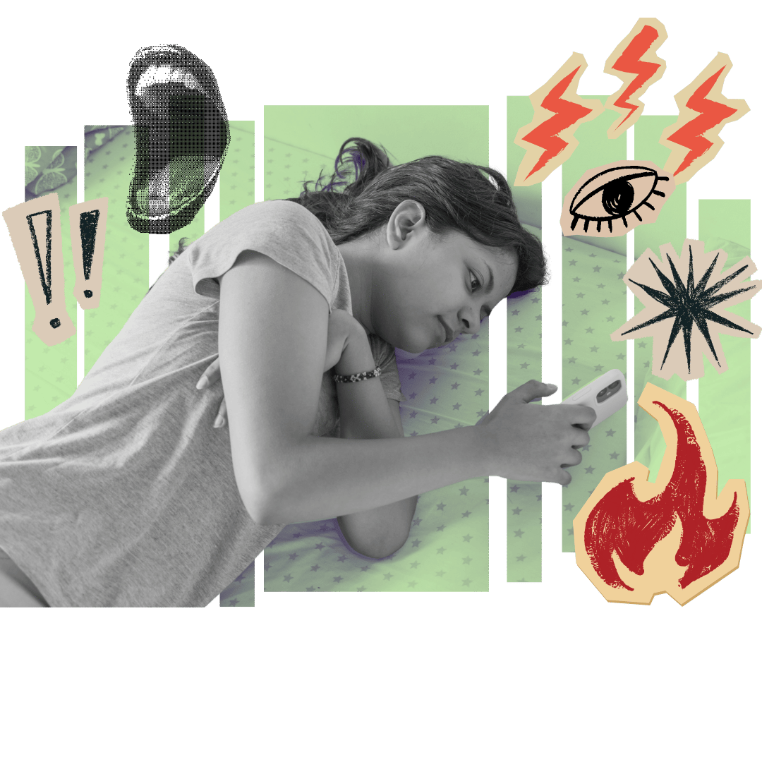 A teen girl lying in bed looking at her smartphone