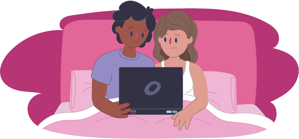 Woman and man sitting in bed watching porn on laptop
