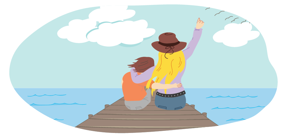 Girl and parent sitting together on pier