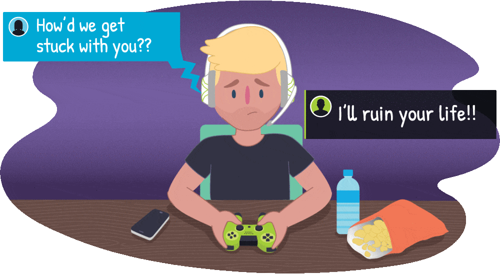 Young male playing online games with cyberbullying in speech bubbles appearing around him